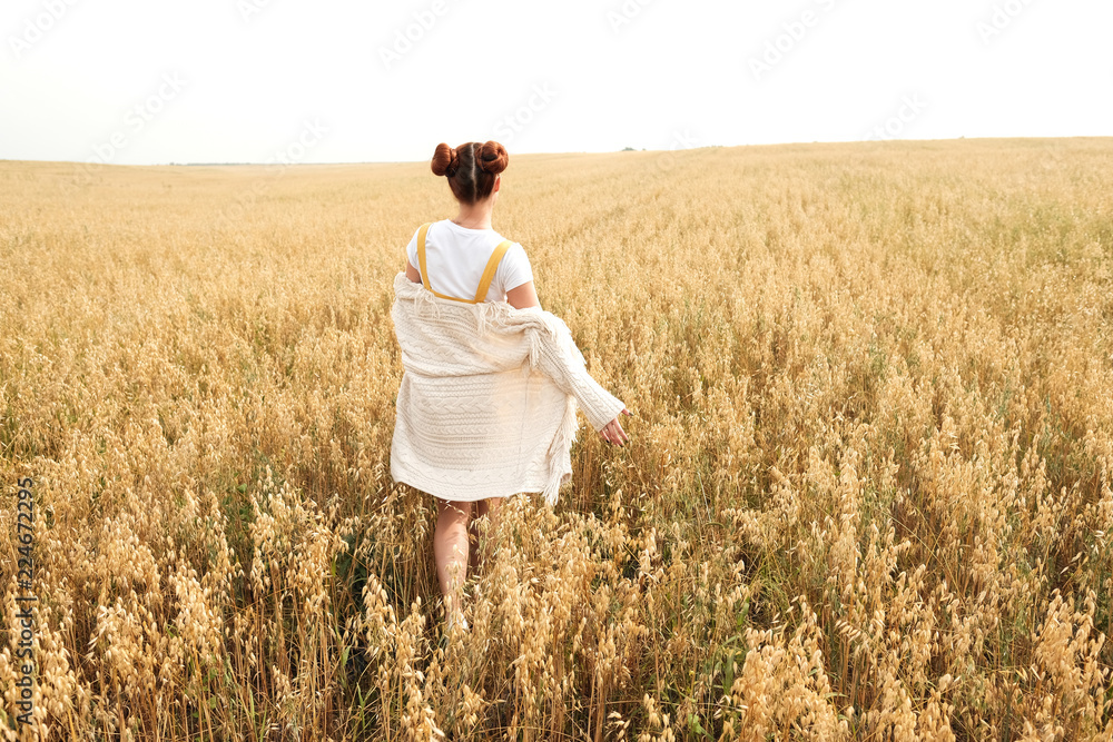 girl with red hair in the autumn field of wheat girl with red hair in the autumn field of wheat