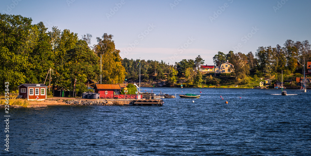 Stockholm - September 23, 2018: Little speedboat traveling in the Swedish Archipelago, Sweden