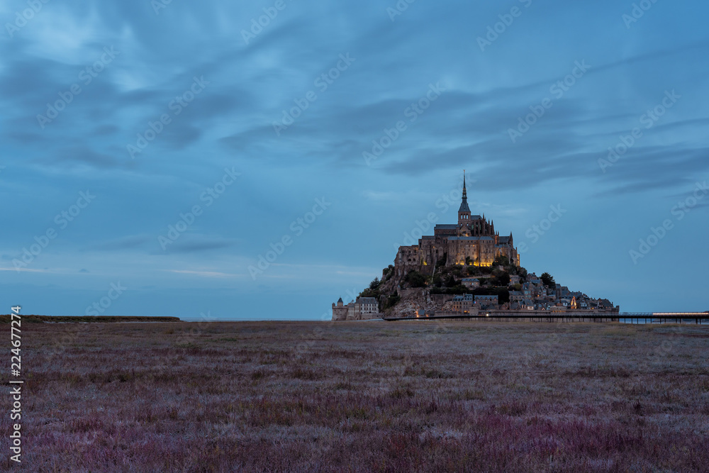 French landscape - Normandie. The Mont Saint Michel after sunset in twilight. 