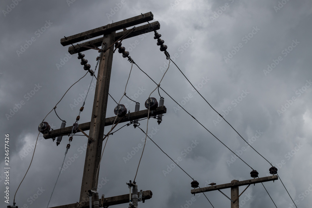black clouds and electric pole before rainy background black clouds and electric pole before rainy background