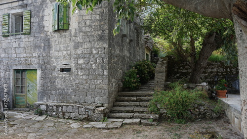 Fototapeta Naklejka Na Ścianę i Meble -  old stone stairs in garden