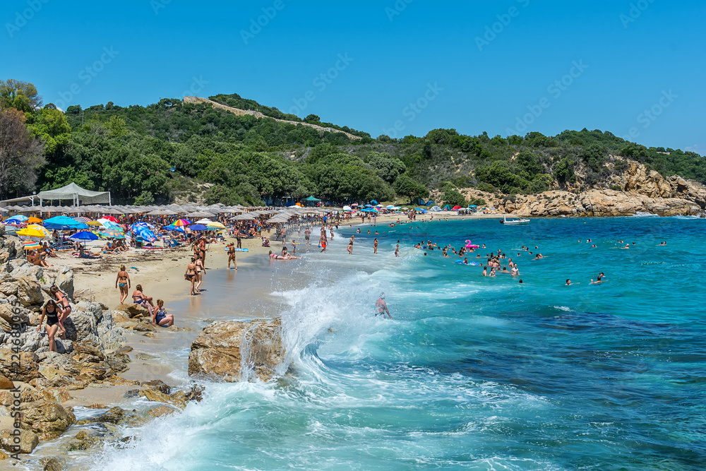 Naklejka premium Olympiada, Greece - August 11, 2018: Proti Ammoudia beach, one of the most beautiful beaches in the Aegean Sea.