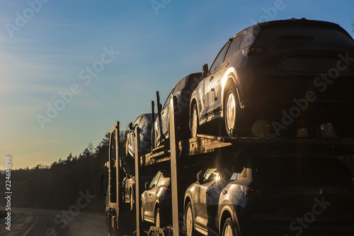 transportation of car on semi-trailer photo