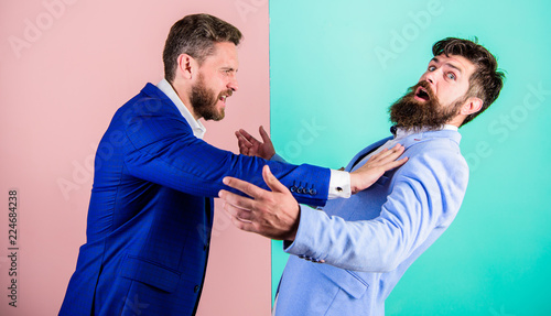 Valokuva Hostile situation between opposing colleagues