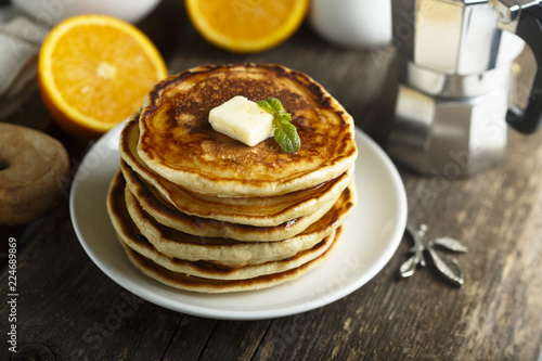 Homemade pancakes with honey and butter