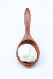 
Fresh yogurt on wooden spoon for beauty skin.