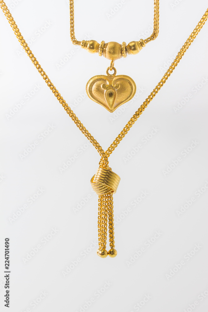 Golden heart pendant isolated on white, golden bind necklace on white, Golden heart pendant isolated on white, golden bind necklace on white,