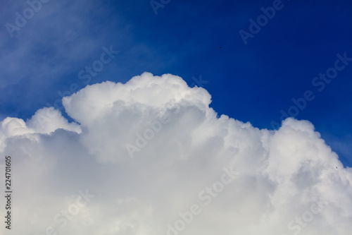 White creamy clouds in the sky as a background