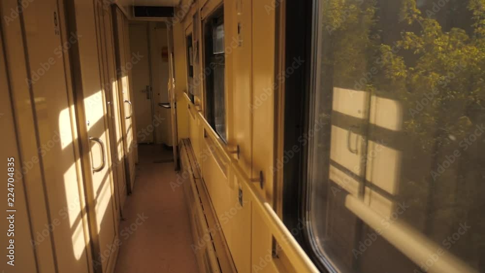 Interior of train railroad car sunlight compartment with night corridor before departure. slow motion video. Corridor of the compartment car of the lifestyle new train. train rail car from inside Interior of train railroad car sunlight compartment with night corridor before departure. slow motion video. Corridor of the compartment car of the lifestyle new train. train rail car from inside