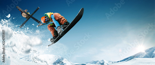 Skiing. Snowboarding. Extreme winter sports photo