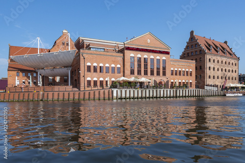 Philharmonic Hall on the Olowianka Island in Gdansk and Motlawa River, Poland.