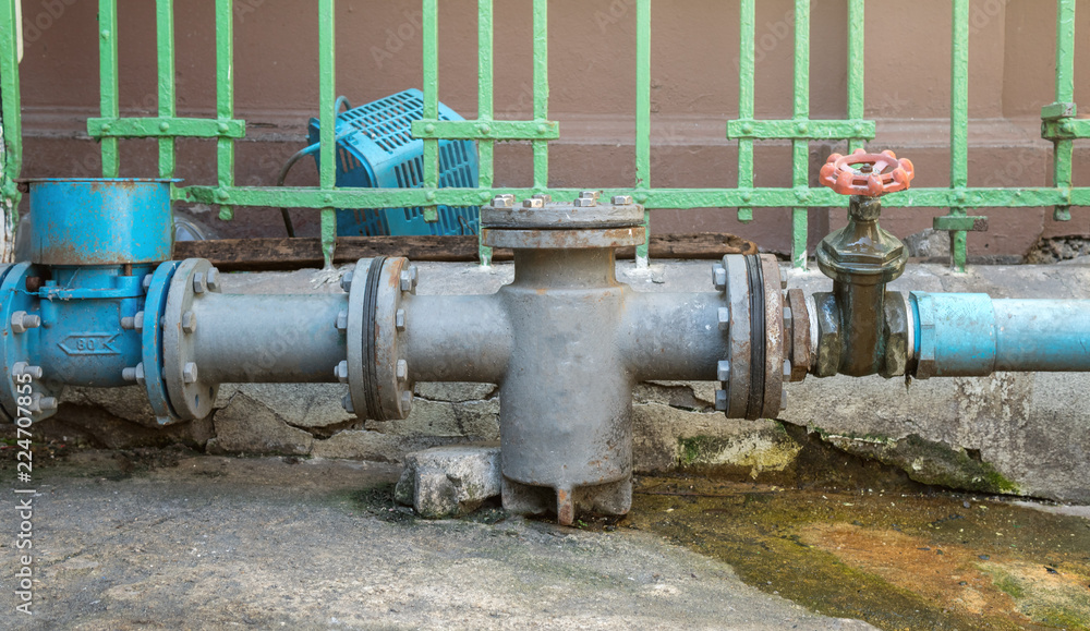 Water supply pipeline valves and faucets and are old and rusting.Near the deterioration and should maintenance and industry Water supply pipeline valves and faucets and are old and rusting.Near the deterioration and should maintenance and industry