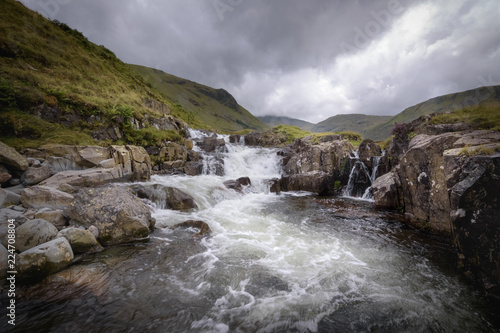 Serene and wild waterfall landscape Lake District England