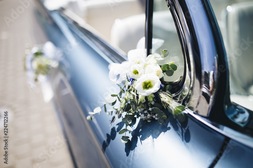 Vintage blue American car decorated for wedding