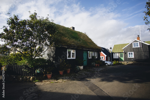 Small village buildings with grass roof in Faroe islands