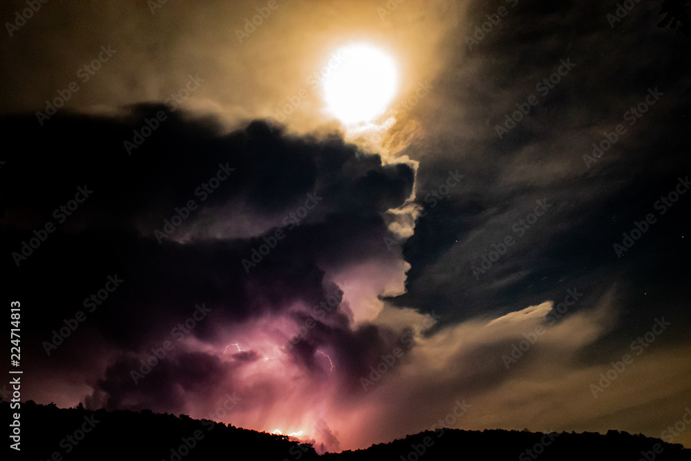 Fototapeta premium Lightning Behind the Mountain at night