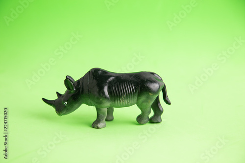 rhino toy on colorful background
