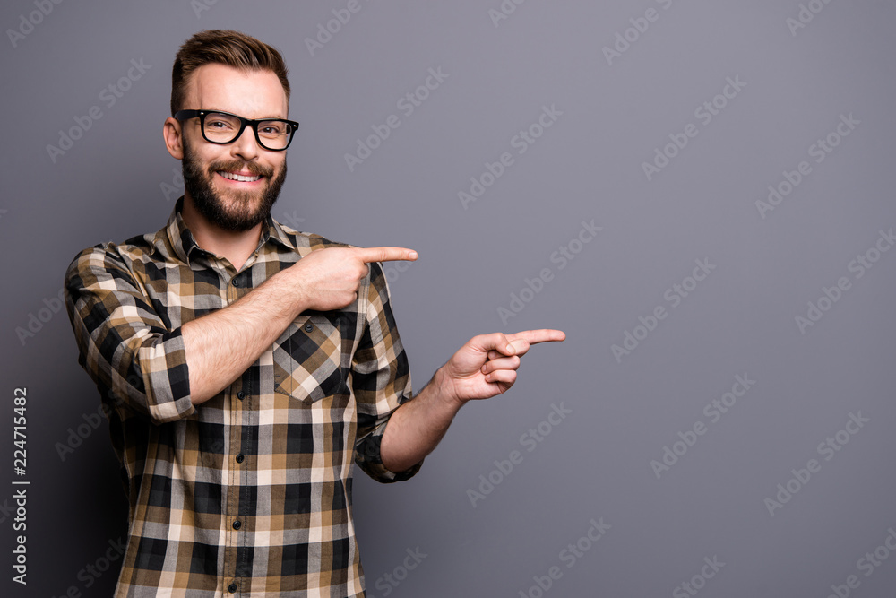 Cute attractive man in spectacles isolated on gray background sh Cute attractive man in spectacles isolated on gray background sh