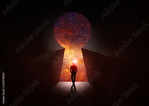 Man in front of open door with universe behind