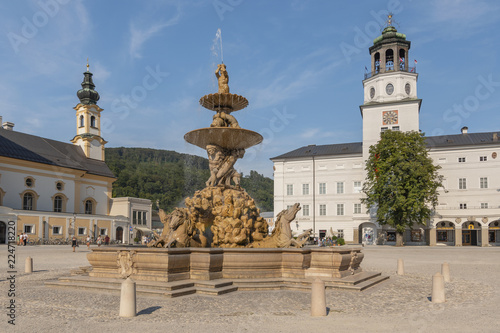 The fountain of Residence square in the old town of Salzburg Austria.
