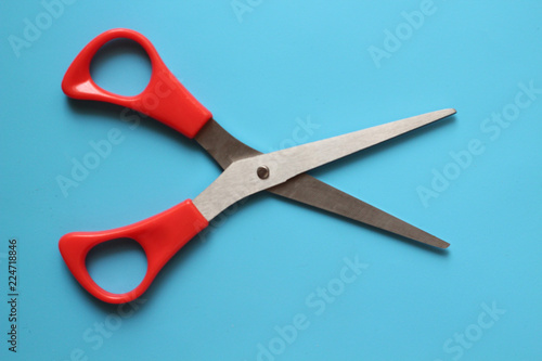 variations of layouts of stationery items, scissors on a colored background