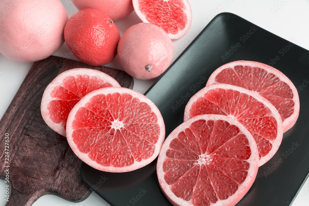 Citrus fruits - grapefruits, lemons, mandarins, oranges - on table. Closeup. Selective focus. Citrus fruits - grapefruits, lemons, mandarins, oranges - on table. Closeup. Selective focus.