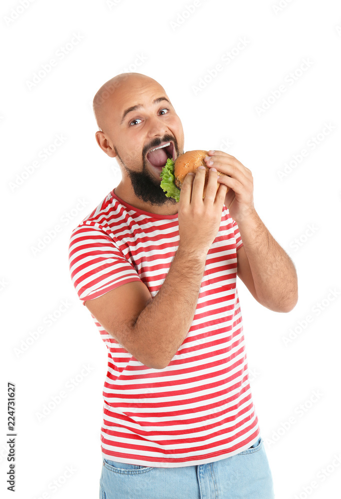Overweight man with hamburger on white background Overweight man with hamburger on white background