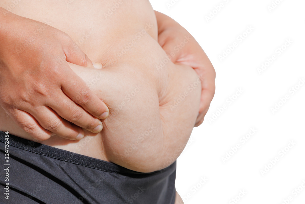 soft focus woman is worry body shape with excess abdominal fat isolated on white background and clipping part . soft focus woman is worry body shape with excess abdominal fat isolated on white background and clipping part .