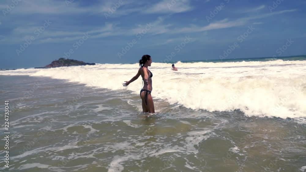 Young woman enjoying sea,having fun, super slow motion
Young woman enjoying sea,having fun, super slow motion