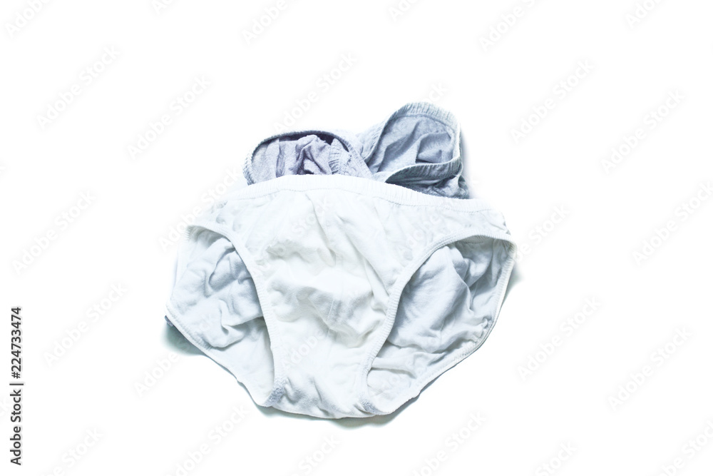 stack of grey and white cotton panty on white background isolated