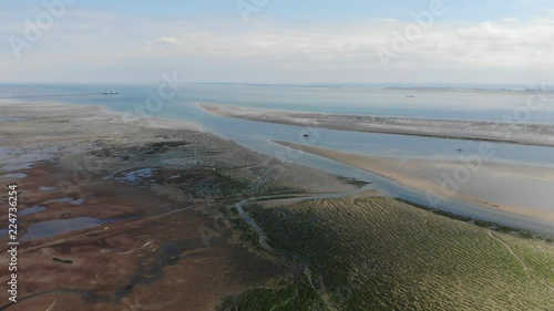 Aerial view of sand, mud flats and sea weed when the tide is out at Chalkwell Beach where the river meets the sea. photo