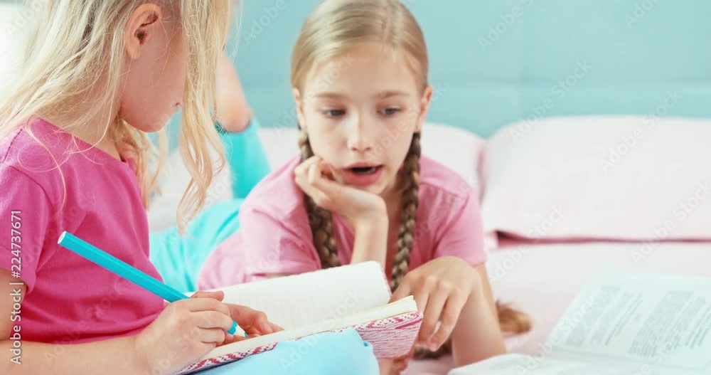 Two sisters have a good time in the bedroom Two sisters have a good time in the bedroom