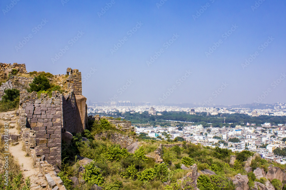 Ancient Stone Walls on the Hillside Looking out towards the Qutb Shahi Tombs at Golconda Fort in Hyderabad, India