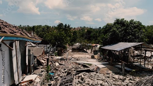 A cinematic aerial shot of the damage done by the earthquake in north Lombok, Indonesia.