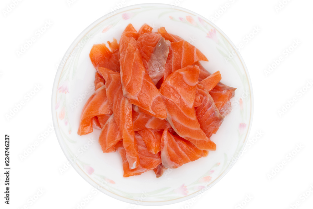 sliced raw salmon in dish isolated on white background, clipping paths sliced raw salmon in dish isolated on white background, clipping paths