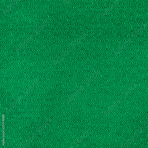 Fabric of green color for warm autumn dress or skirt photo