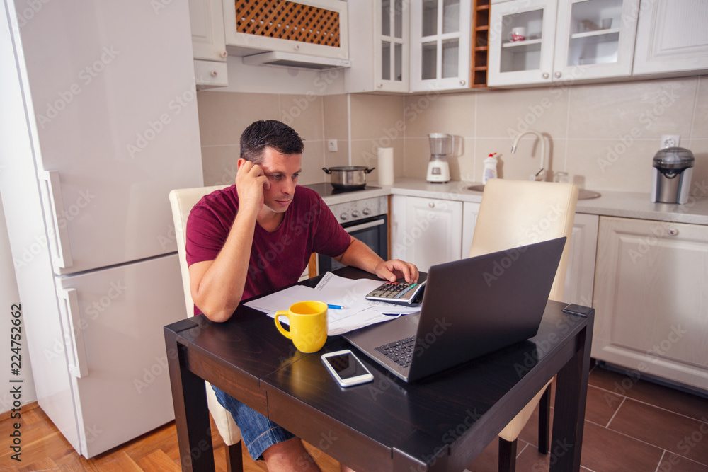 man doing account about expenses at home, family budget and finances, calculate their bills, planning budget.. man doing account about expenses at home, family budget and finances, calculate their bills, planning budget..