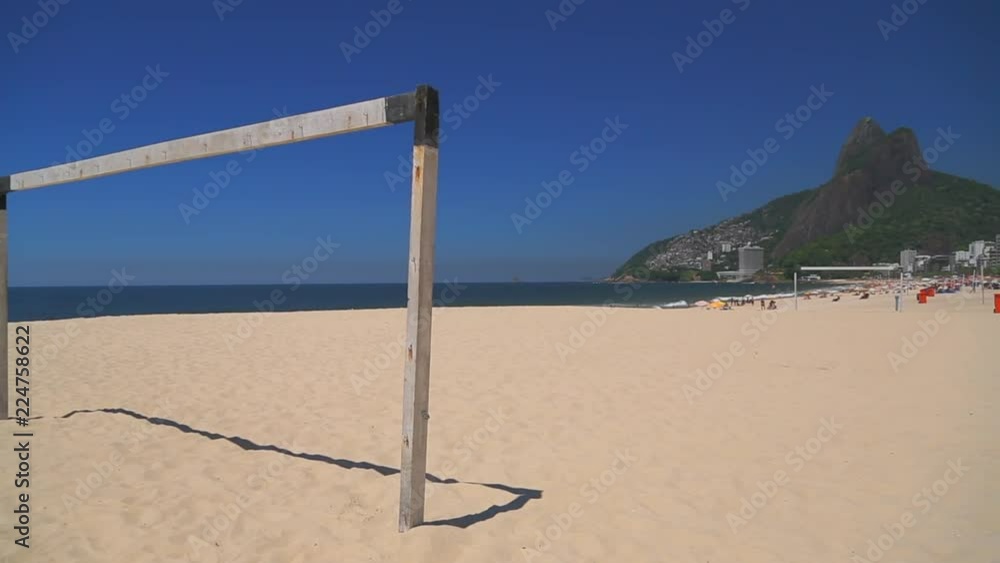 Makeshift Goalposts on a Sandy Beach