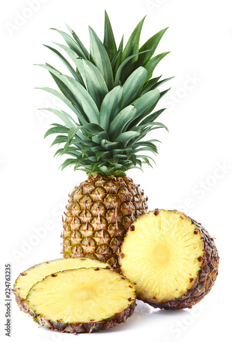 Fresh whole and sliced pineapple