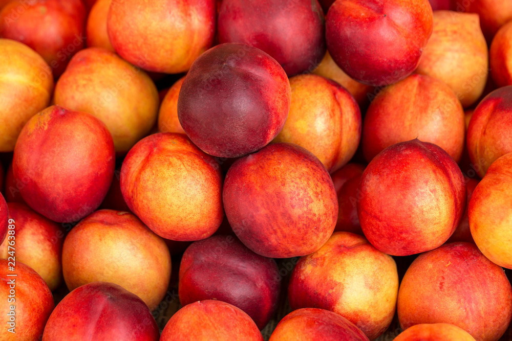 a beautiful fragrant ripe nectarine, the view from the top a beautiful fragrant ripe nectarine, the view from the top