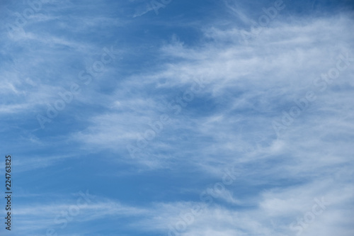 Beautiful white cirrus clouds on blue sky