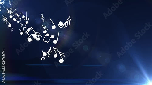 Many musical notes are flown from the side. Blue background photo