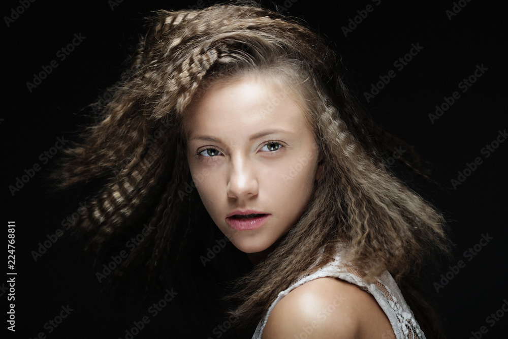 Blond girl with curly hair. Beautiful model woman with wavy hair Blond girl with curly hair. Beautiful model woman with wavy hair