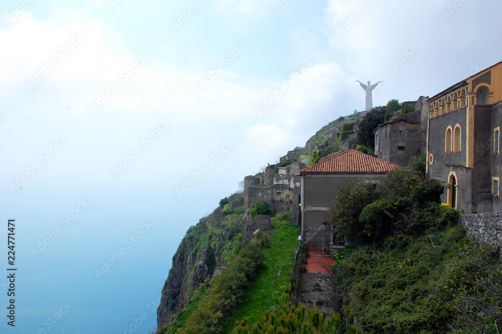 The Statue of Christ the Redeemer of Maratea on the top of the Mountain Saint Biagio. Day. 
