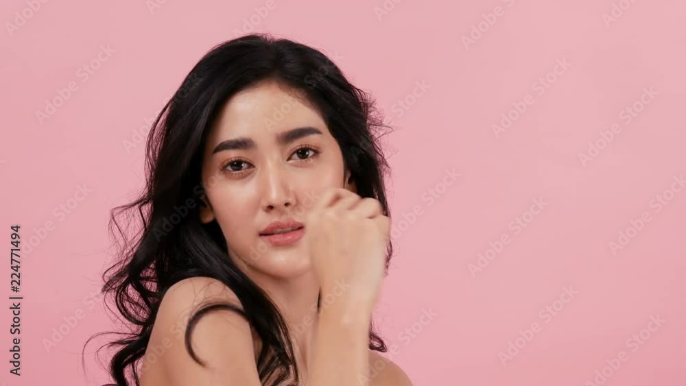 Portrait of beautiful asian woman looking to camera with attractive smile. Beautiful woman looking to camera. People with beauty and skin care concept. Portrait of beautiful asian woman looking to camera with attractive smile. Beautiful woman looking to camera. People with beauty and skin care concept.