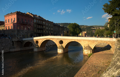 Latin bridge in the city center of Sarajevo over Miljacka river. The Sarajevo Museum is located on the right bank of the river. 