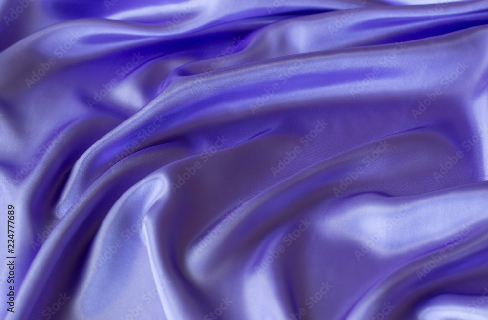 Obraz premium Гладкий элегантный сиреневый шелк можно использовать в качестве фона