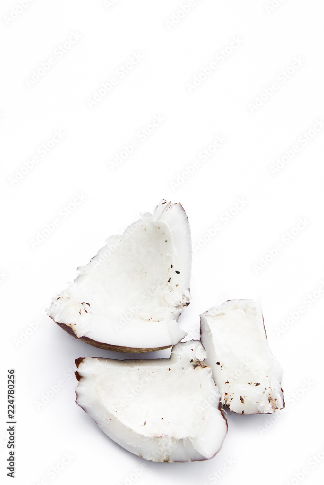 coconut slices top view isolated on white background. healthy food wallpaper. coconut slices top view isolated on white background. healthy food wallpaper.