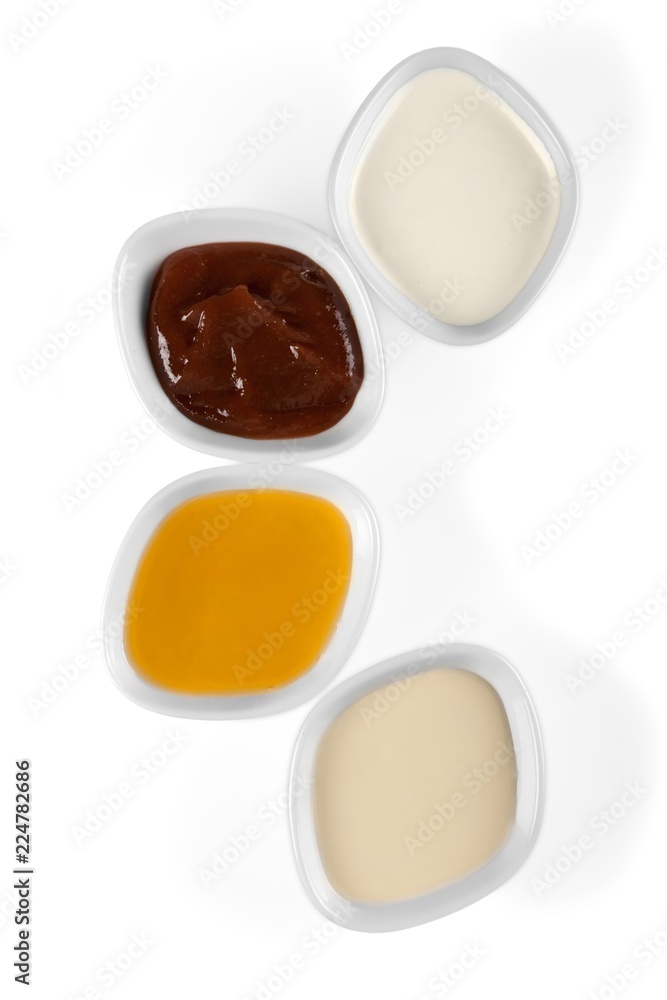 the various barbecue sauces in ceramic bowls the various barbecue sauces in ceramic bowls