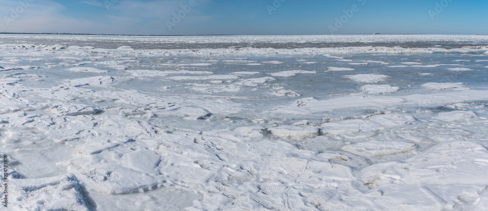 Panoramic View of the Majestic Icy Wonderland. Snow and ice. Ice piles in baltic sea. Tallinn, Estonia, the Baltic States Panoramic View of the Majestic Icy Wonderland. Snow and ice. Ice piles in baltic sea. Tallinn, Estonia, the Baltic States